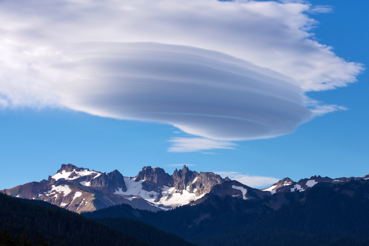 Lenticular clouds forming above Goat Rocks